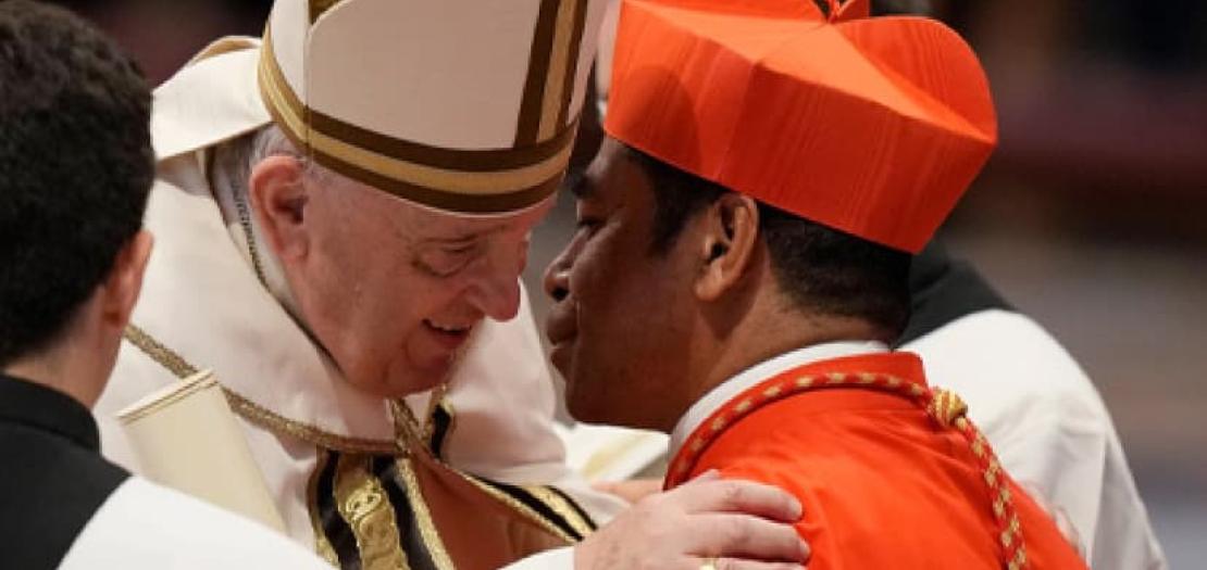 Pope Francis greets Cardinal Virgilio do Carmo da Silva, Archbishop of Dili, Timor-Leste, during the Aug. 27, 2022, consistory in Saint Peter’s Basilica in whch Silva was elevated