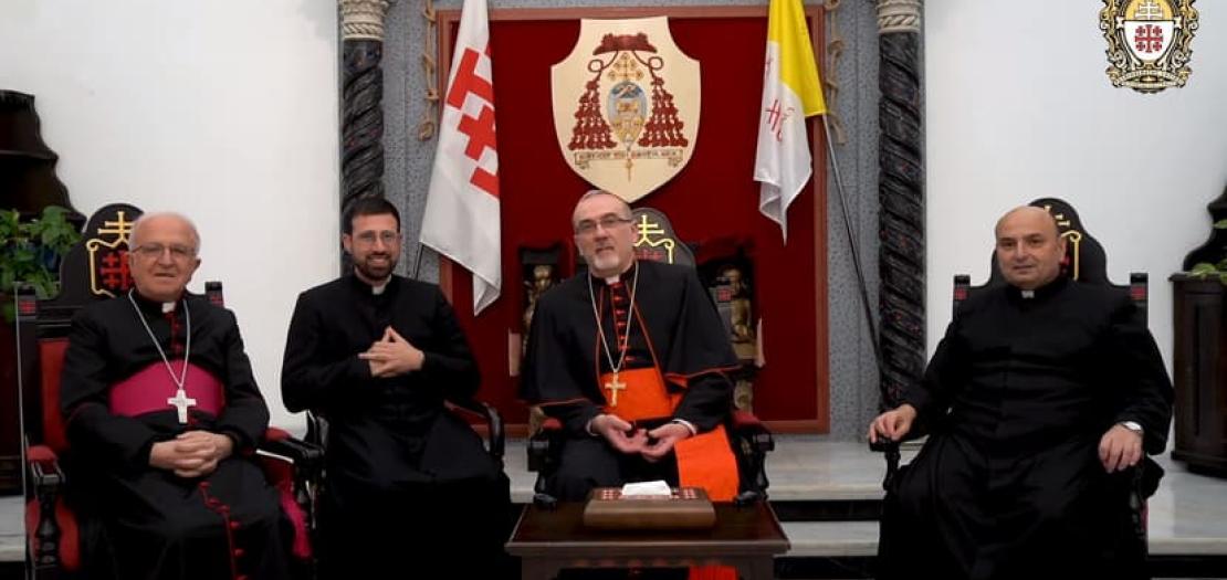 From left to right, Bishop William Shomali, Father Davide Meli, Cardinal Pierbattista Pizzaballa, and Father Gabriel Romanelli speak during a video message to the parishioners of Gaza published March 30, 2024.
