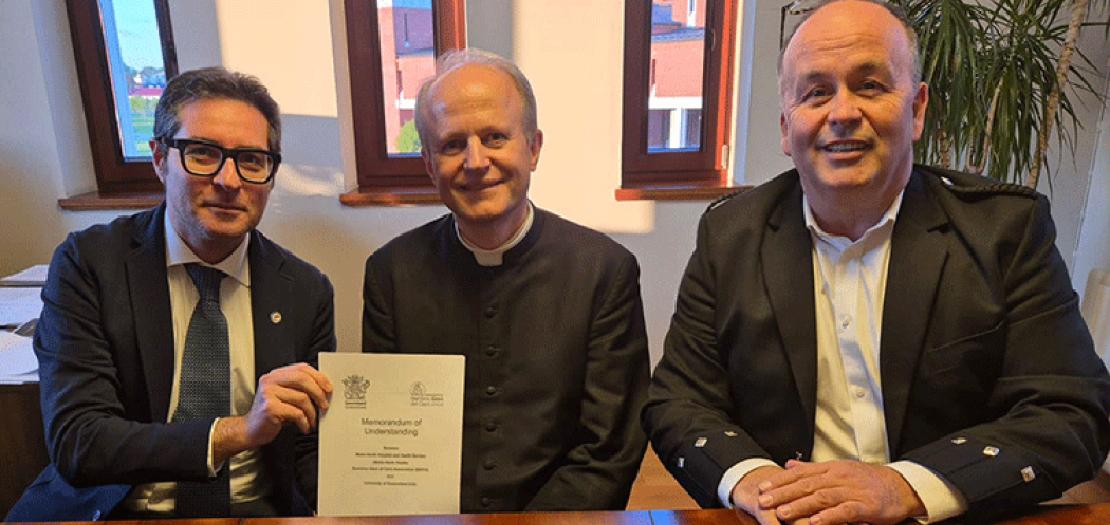  Dr Matteo Di Nardo, left, Msgr Tomasz Trafny and Professor John Fraser at the signing of the agreement at The John Paul II Sanctuary in Kraków, Poland 