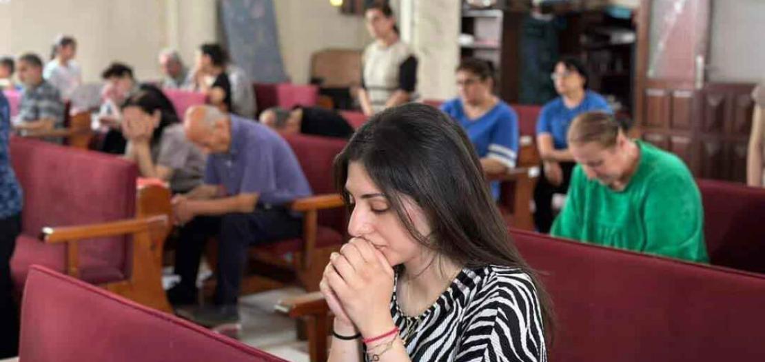 The faithful pray at the Church of the Holy Family in Gaza City