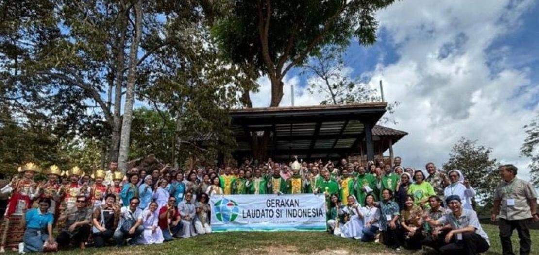 Participants of the third national gathering of the Indonesian Laudato Si’ Movement (GLSI) pose with a banner in Kalianda, South Lampung, Indonesia, October 24-27, 2024