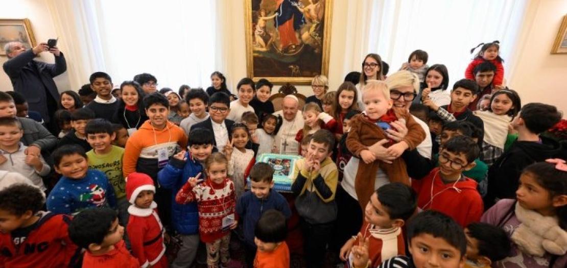 Group photo of Pope Francis with children from the Santa Marta Dispensary