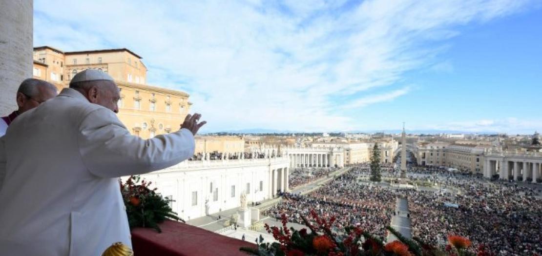  Pope Francis waving to the crowds in Saint Peter's Square 