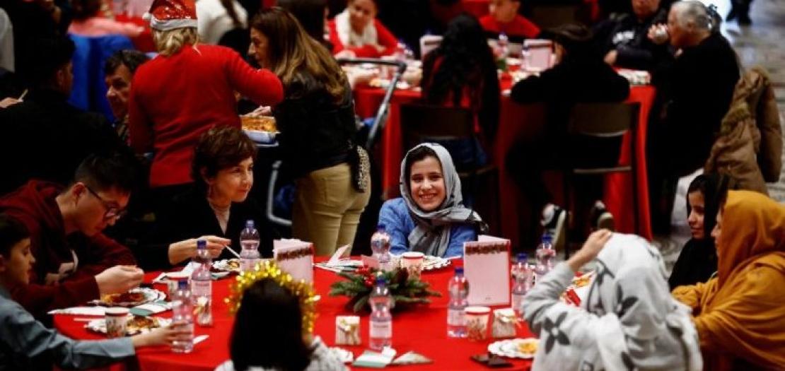 Traditional Christmas lunch for needy and poor organised by Community of Sant'Egidio in the Basilica of Santa Maria in Trastevere, in Rome 