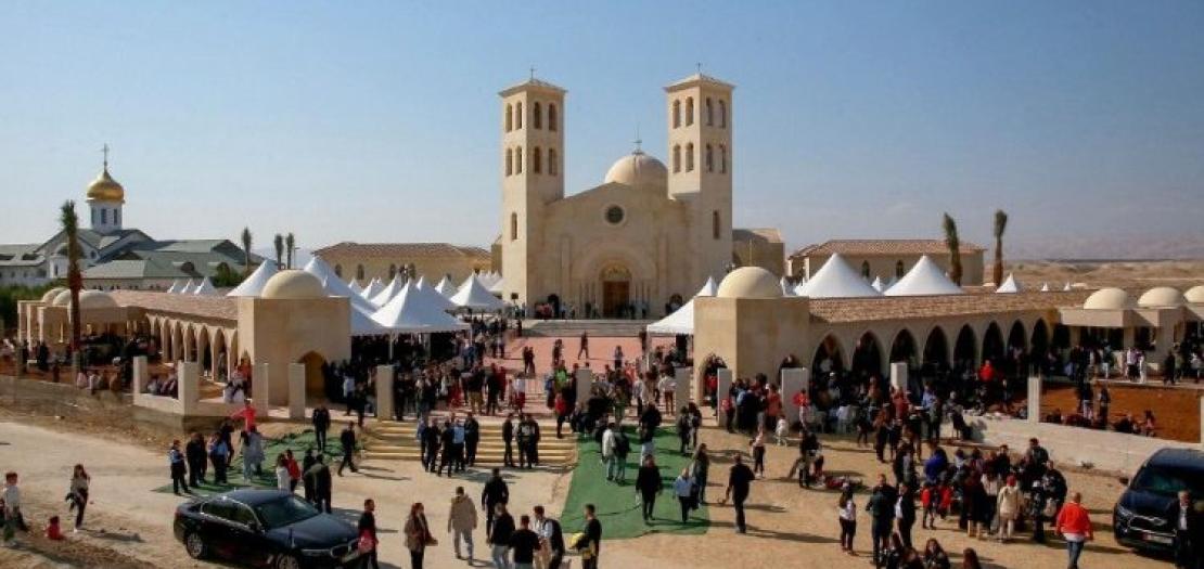 People arrive for the dedication Mass of the Church of the Baptism of the Lord on January 10, 2025 