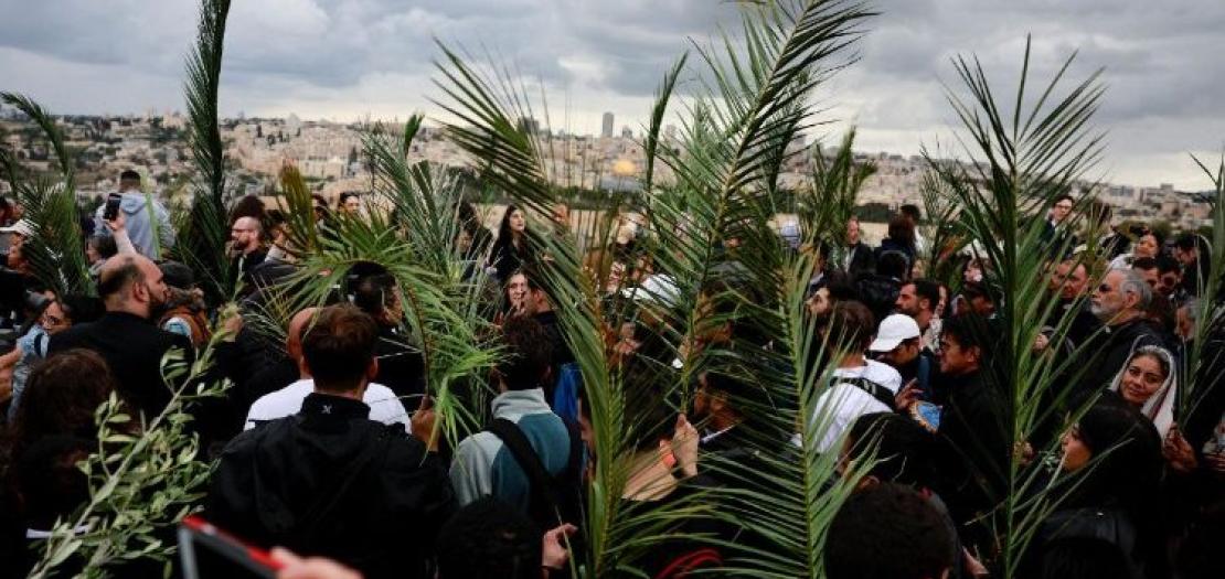 Christian worshippers attend a Palm Sunday procession in Jerusalem 