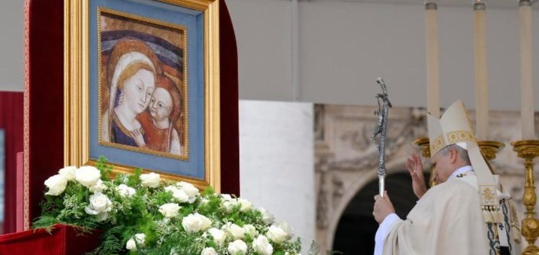 Pope Leo XIV blesses the image of Our Lady of Good Counsel at the end of Mass on Sunday, May 18 