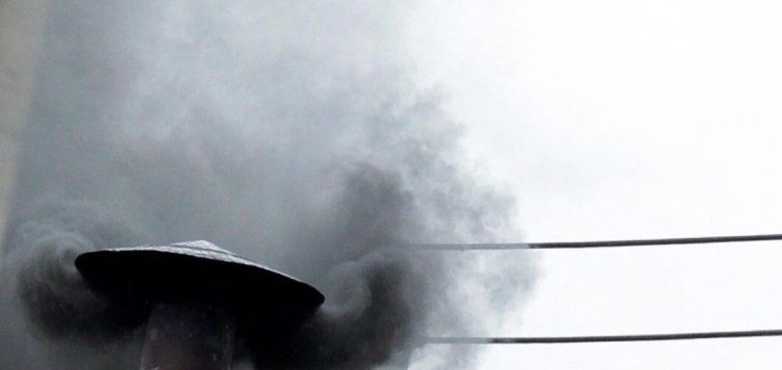 Black smoke comes out of the Sistine Chapel 