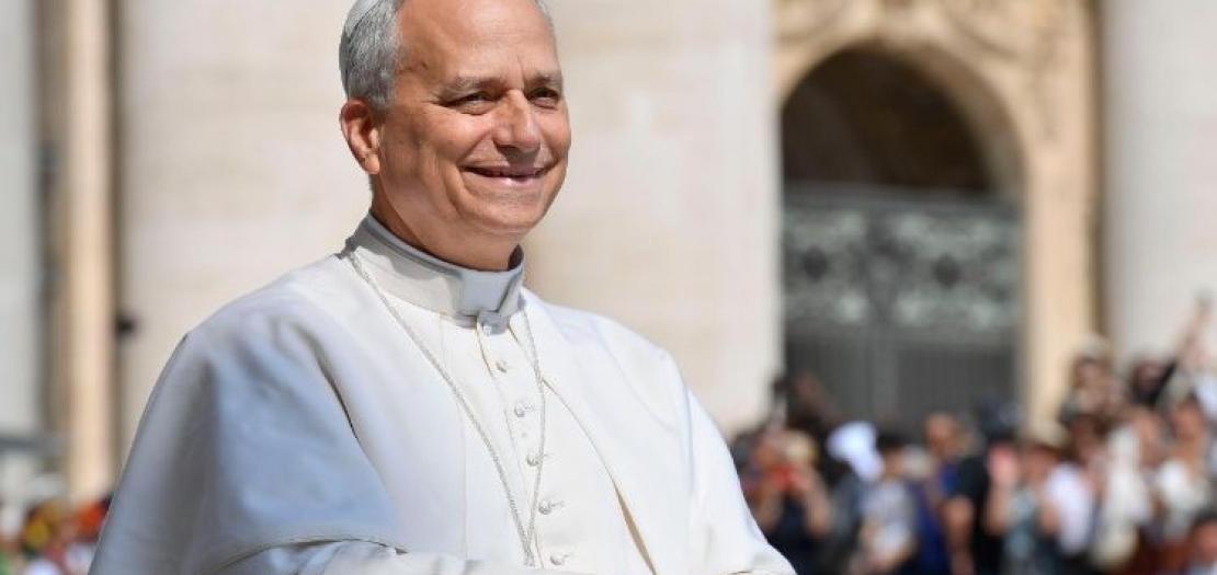 Pope Leo XIV smiles as he arrives at the Wednesday General Audience on June 11, 2025 