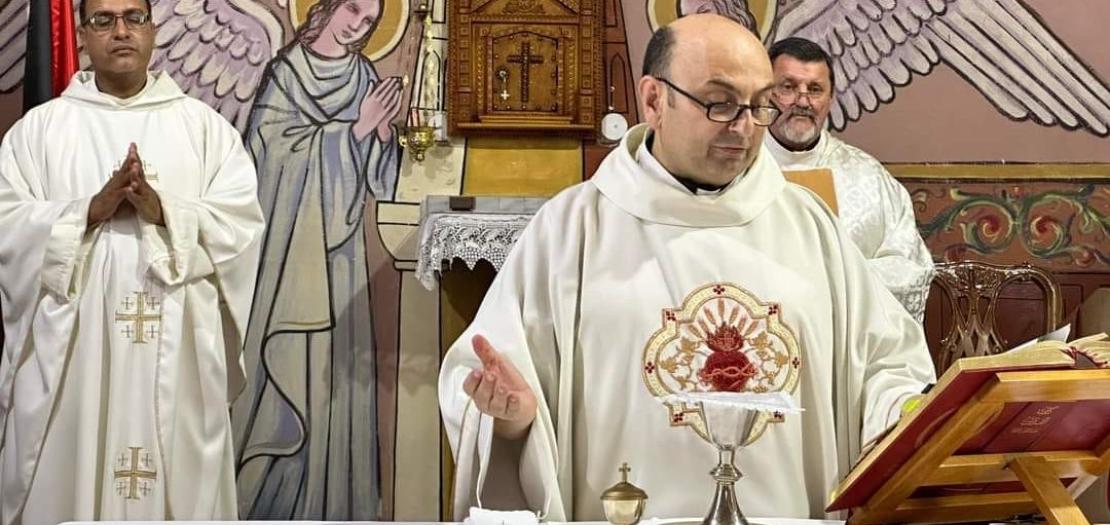 Father Gabriel Romanelli celebrating Mass in Holy Family Church