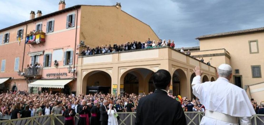 Pope Leo XIV greetings the crowds in Castel Gandolfo following the Angelus