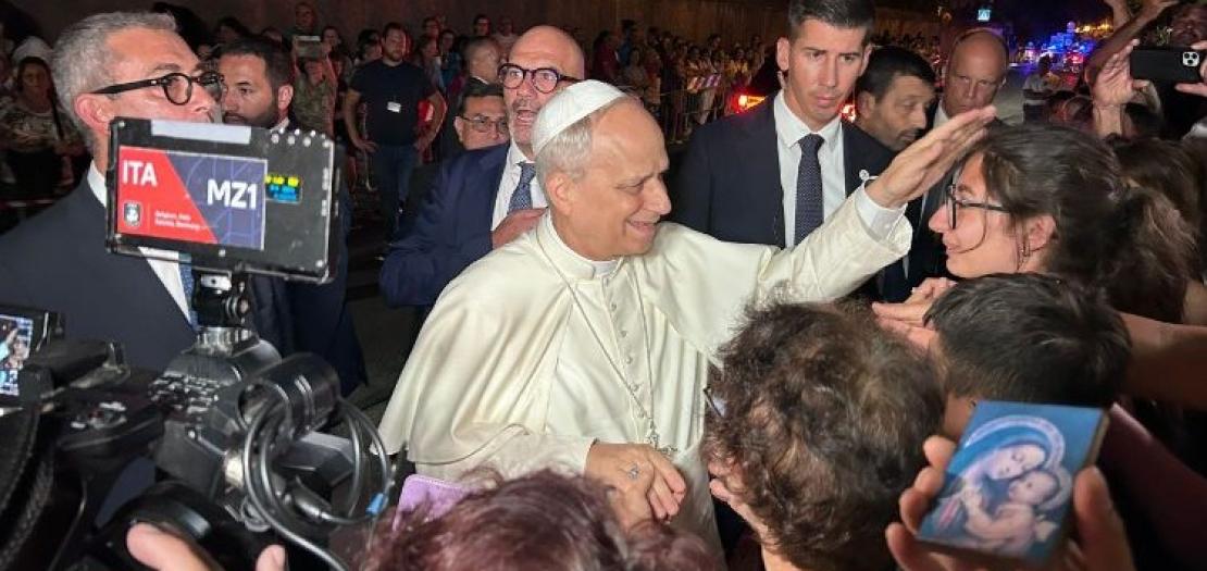 Pope Leo greets the faithful as he leaves Castel Gandolfo to return to the Vatican 