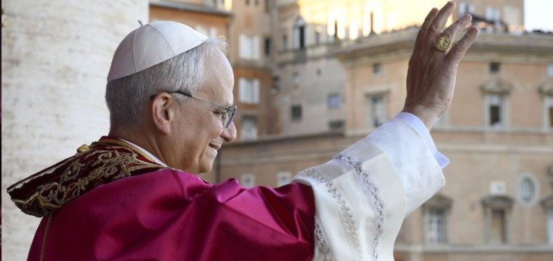 Pope Leo XIV greets pilgrims gathered in St Peter's Square during his first appearance at the Loggia delle Benedizioni on 8 May 2025 