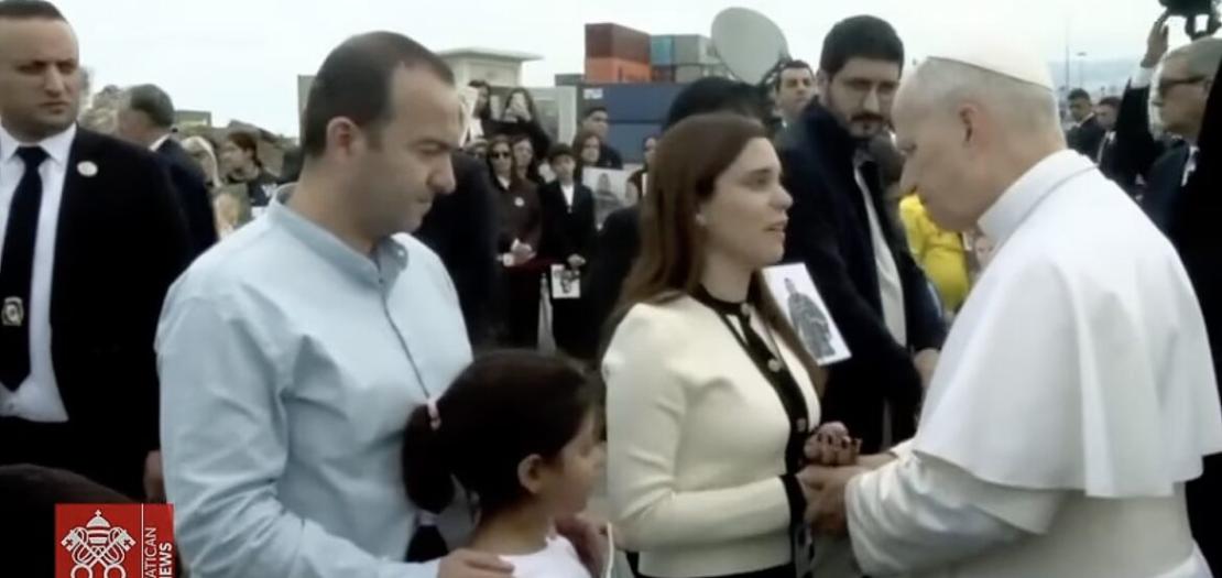 Melvine Khoury, 36, who underwent eight surgeries following the 2020 Beirut blast that killed 220 and injured scores more, speaks to Pope Leo XIV December 2, 2025 during his visit to the Lebanese port to pray for victims of the explosion and their families.