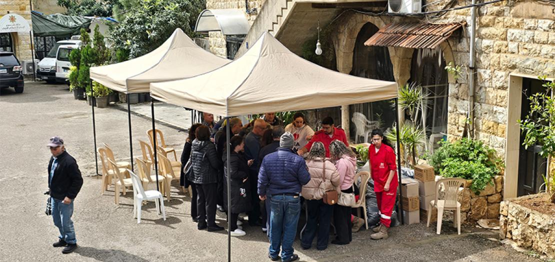 Families registering for aid with Caritas Lebanon