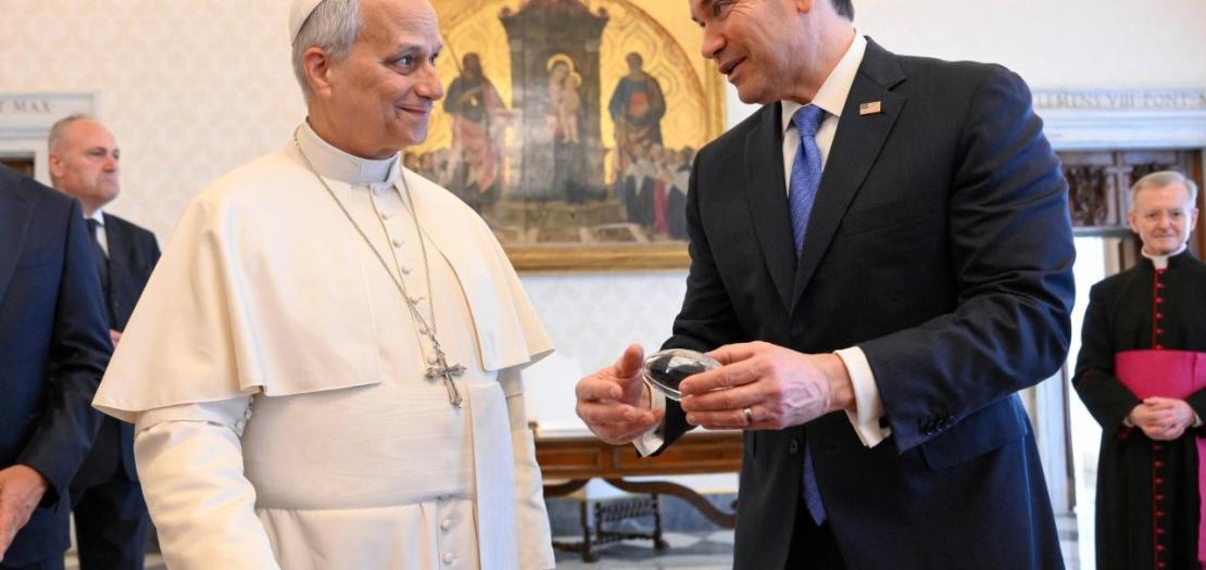 ecretary Rubio presents the Pope with a crystal football 