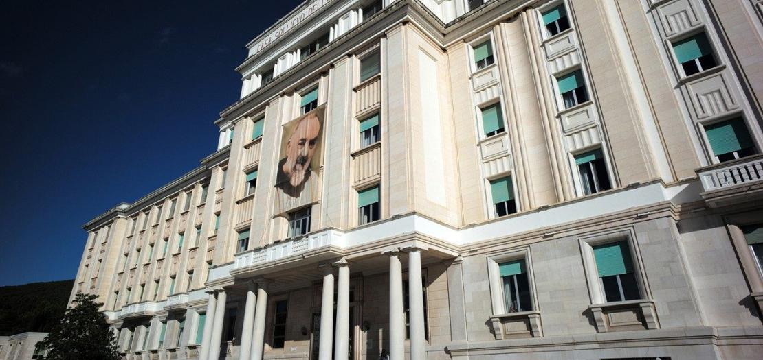 Facade of the House for the Relief of Suffering Foundation in San Giovanni Rotondo, Italy 