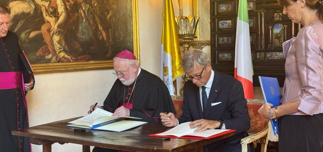 Archbishop Gallagher and Ambassador Di Nitto sign the agreement in July 2025